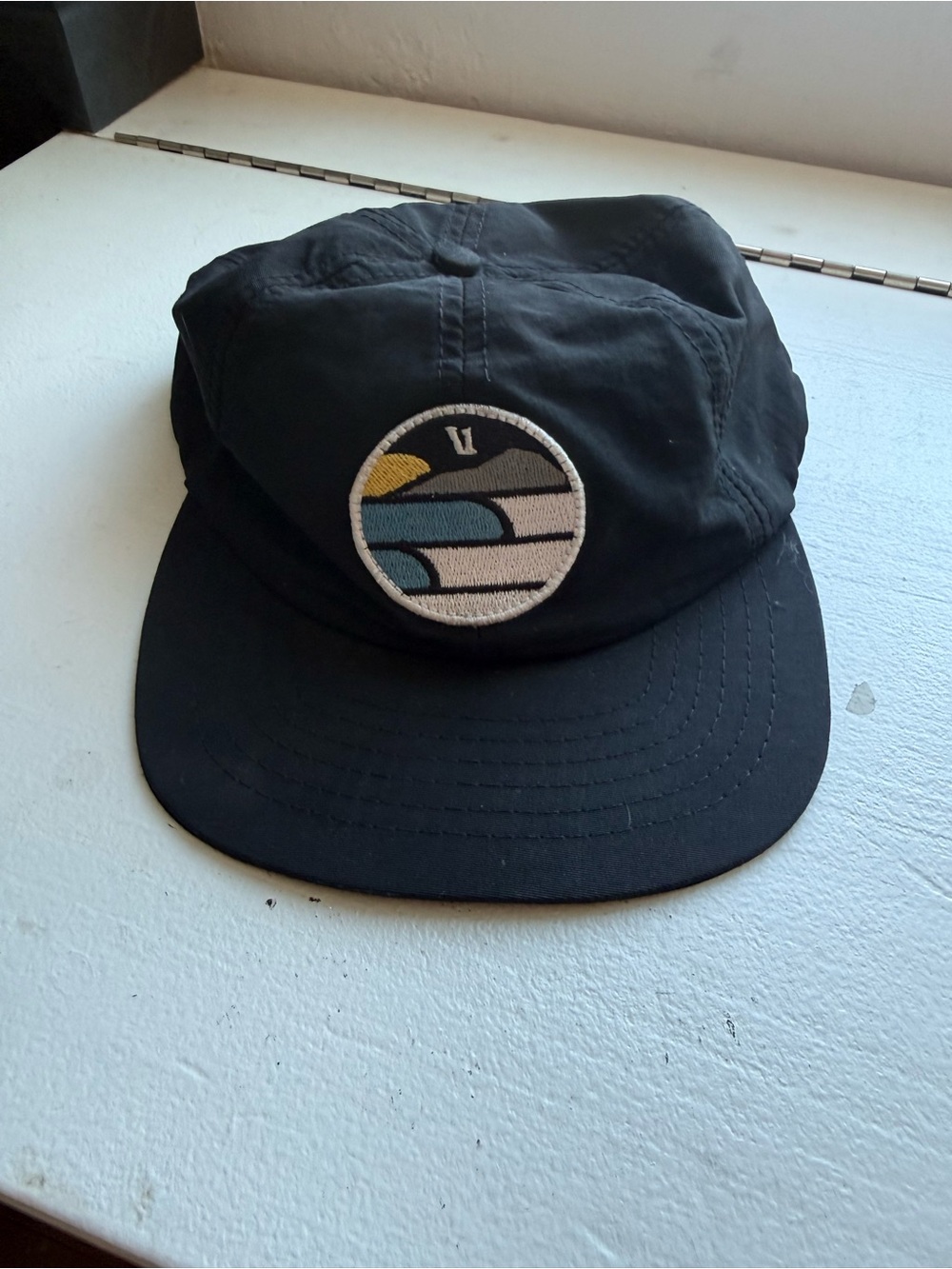 Vuori Black Patch Logo 5-Panel Hat with Sunset Graphic